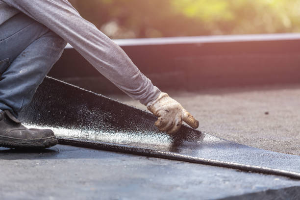 Professional Basement Waterproofing technician working in Laurel, IN